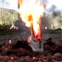 slow motion - burning Nike Air Max 97s